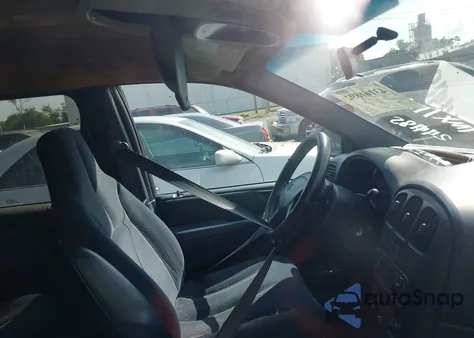 2003 Dodge Grand Caravan Sport z USA, uszkodzony, nr VIN 2D4GP44323R244185